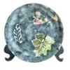 Foto de um(a) Prato em cerâmica pintado a mão -Prado, da categoria de Pratos Decorativos. PRADO - prato em cerâmica pintado a mão, com motivos de plantas, manufatura da tradicional marca dos anos 50 -70. Peça... Vendido no marketplace Trésors.