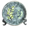 Foto de um(a) Prato em cerâmica pintado a mão - Prado, da categoria de Pratos Decorativos. PRADO - prato em cerâmica pintado a mão, com motivos de plantas, manufatura da tradicional marca dos anos 50 -70. Peça... Vendido no marketplace Trésors.