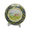 Foto de um(a) Prato decorativo em cerâmica pintada à mão, da categoria de Pratos Decorativos. Prato decorativo em cerâmica pintada à mão, para pendurar na parede (acompanha o suporte traseiro). Paisagem bucólica da... Vendido no marketplace Trésors.