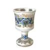 Foto de um(a) Taça decorativa em porcelana, da categoria de Taças. Encontre essa linda taça de porcelana vintage e decore seu ambiente! Com medidas de altura de 14 cm e diâmetro da boca de 8... Vendido no marketplace Trésors.