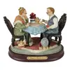 Foto de um(a) Escultura casal de idosos - Athena Collection, da categoria de Escultura. Grupo escultórico em matéria inorgânica da ATHENA COLLECTION. Apresenta casal de idosos tomando chá. Peças em policromia.... Vendido no marketplace Trésors.