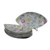 Foto de um(a) Conjunto com 6 coviletes da porcelana schmidt, da categoria de Acessórios de cozinha. Jogo de 6 coviletes de porcelana branca com flores em policromia da manufatura schmidt. Mede 19c x 10l. Em bom estado de... Vendido no marketplace Trésors.