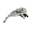 Foto de um(a) Enfeite em formato de violoncelo, da categoria de Acessórios para casa. Antigo enfeite para decoração ao gosto capodimonte em porcelana possivelmente italiana. Em bom estado de conservação. Mede... Vendido no marketplace Trésors.