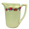 Foto de um(a) Cremeira em porcelana, da categoria de Acessórios de cozinha. Cremeira em porcelana branca (manufatura não identificada), com flores em policromia. Em bom estado de conservação. Vendido no marketplace Trésors.