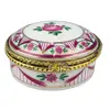 Foto de um(a) Porta-jóia, da categoria de Porta-Jóias. Pequeno porta-jóias em porcelana branca com motivo floral em policromia e metal dourado. Mede 5cm de diâmetro, mínimos... Vendido no marketplace Trésors.