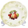 Foto de um(a) Prato decorativo em porcelana, da categoria de Pratos Decorativos. Prato para decoração em porcelana da manufatura Dresden em tons de verde claro e frutas em policromia. Possui perdas em uma... Vendido no marketplace Trésors.