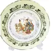 Foto de um(a) Prato decorativo em porcelana da Real S.paulo, da categoria de Pratos Decorativos. Prato ornamental para parede em porcelana branca da REAL / S PAULO / MADE IN BRAZIL. No centro cena oriental com figuras em... Vendido no marketplace Trésors.