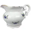 Foto de um(a) Cremeira em porcelana real S.paulo, da categoria de Bules. Cremeira em porcelana branca da real s.paulo com flores em policromia e filetes dourados. Mede 9ax 14c. Delicada, em bom... Vendido no marketplace Trésors.