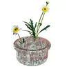 Foto de um(a) Pique Fleurs Cristal, da categoria de Vasos. GLASS FLOWER FROG ou PIQUE FLEURS, são perfeitas para pequenos arranjos ou para serem usadas dentro de um vaso, para... Vendido no marketplace Trésors.
