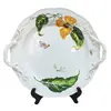 Foto de um(a) Imponente prato para sobremesa em porcelana branca, da categoria de Bandejas. PORCELANA / CERÂMICAS - Imponente prato para sobremesa em porcelana branca, com pegas laterais em relevos e borda trabalhada... Vendido no marketplace Trésors.