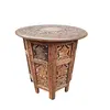 Foto de um(a) Mesa de apoio Indiana, da categoria de Mesas laterais. Lindíssima mesa de apoio indiana em madeira nobre toda trabalhada, com rico entalhe floral, parte central do tampo... Vendido no marketplace Trésors.