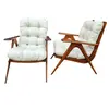 Foto de um(a) Par de poltronas vintage anos 60, da categoria de Poltronas. As poltronas vintage dos anos 60 são uma verdadeira viagem no tempo, trazendo à sua decoração um toque de elegância e... Vendido no marketplace Trésors.