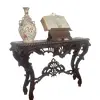 Foto de um(a) Console entalhado em madeira maciça – Estilo Clássico/Antiquário, da categoria de Aparadores e Buffet. Belíssimo console em madeira nobre maciça, ricamente entalhado à mão, com detalhes florais e arabescos em alto-relevo. A... Vendido no marketplace Trésors.