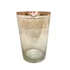 Foto de um(a) Jarra para drink, da categoria de Jarros. Antiga jarra para drink na tonalidade âmbar com lapidação manual e borda com filete dourado. Medidas 16A x 11cm de diâmetro.... Vendido no marketplace Trésors.