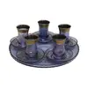 Foto de um(a) Conjunto de chá Turco, da categoria de Acessórios de cozinha. Conjunto para chá em vidro na tonalidade lilás, acompanha bandeja redonda com decoração em arabescos dourados e 5 copos com... Vendido no marketplace Trésors.
