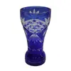 Foto de um(a) Vaso Cônico Em Cristal Double, da categoria de Vasos. Vaso cônico em cristal azul double com lapidações manuais. Medidas 18A X 9D. Em bom estado com pequeno bicado na borda. Vendido no marketplace Trésors.