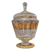 Foto de um(a) Bomboniere de Cristal Vintage com Decoração em Filetes e Arabescos Dourados, da categoria de Garrafas, potes e jarros. toque de classe clássica para o seu ambiente. Esta elegante bomboniere em cristal translúcido destaca-se pelo seu design... Vendido no marketplace Trésors.