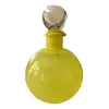 Foto de um(a) Antigo Perfumeiro Decorativo Em Murano Amarelo Art Deco, da categoria de Garrafas, potes e jarros. Italy Glass Antigo perfumeiro decorativo em Murano amarelo com a tampa com detalhes em branco. Peça toda original. Art Deco.... Vendido no marketplace Trésors.