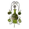 Foto de um(a) Antiga Garrafa Licoreira Copinhos Murano Veneziano Verde, da categoria de Garrafas, potes e jarros. Antiga e preciosa licoreira com cinco copinhos em vidro artístico veneziano na cor verde esmeralda, acompanha o suporte... Vendido no marketplace Trésors.