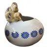 Foto de um(a) Antiga Escultura Ovo Pintinho Vaso Art Deco Porcelana Alemã, da categoria de Vasos. ~ Made in Germany ~ Antigo e lindo vaso decorativo no formato de ovo, com decoração de pintinhos. Peça muito graciosa e a... Vendido no marketplace Trésors.