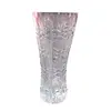 Foto de um(a) Vaso de cristal com lapidação manual, da categoria de Vasos. Fino vaso em cristal com farta lapidação manual. Medidas 21A X 9D. Em bom estado, apresenta imperceptíveis bicados na base. Vendido no marketplace Trésors.
