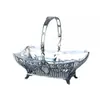 Foto de um(a) Cesta alemã em metal WMF, da categoria de Cestos e Caixas. Elegante cesta em metal espessurado da renomada manufatura alemã WMF. Laterais vasadas com guirlandas de flores. Assente em... Vendido no marketplace Trésors.