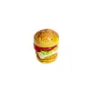 Foto de um(a) Saleiro em cerâmica formato hamburguer, da categoria de Saleiros e pimenteiros. Saleiro em cerâmica com tampa na base em silicone. Perfeito estado. Medidas: 7x5cm. Vendido no marketplace Trésors.
