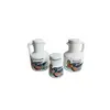 Foto de um(a) Galheteiro com 3 peças porcelana Schmidt, da categoria de Saleiros e pimenteiros. Galheteiro com 3 peças em porcelana Schmidt estampada. Perfeito estado. Medidas peça maior: 11x6,5cm. Vendido no marketplace Trésors.