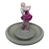 Foto de um(a) Antiga Rara Escultura Art Deco Centro Mesa Hutschenreuther, da categoria de Escultura. Hutschenreuther. Antiga floreira, centro de mesa em porcelana artística alemã, com linda escultura de bailarina no meio da... Vendido no marketplace Trésors.