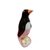 Foto de um(a) Pinguim de Geladeira em Porcelana, Clássico Dos Anos 50, da categoria de Objetos decorativos. Pinguim de geladeira em porcelana com pés e bico dourados, um clássico dos anos 50. A: 22 cm / L: 9,4 cm / P: 9 cm Base: 8,5... Vendido no marketplace Trésors.