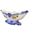 Foto de um(a) Centro de Mesa Anos 40, da categoria de Centro de mesa. Centro de mesa em porcelana policromada, década de 1940 procedência brasileira. A: 13cm L: 30cm P: 11cm Peso: 776g. Vendido no marketplace Trésors.