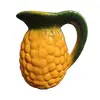 Foto de um(a) Jarra Pineapple Anos 80, da categoria de Garrafas, potes e jarros. Jarra abacaxi em cerâmica vitrificada e policromada, década de 1980 procedência asiática.A: 16,5cm D: 11cm Peso: 680g. Vendido no marketplace Trésors.