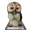 Foto de um(a) Cachepô Coruja Anos 50, da categoria de Cachepot. Coruja em porcelana policromada com olhos de vidro, década de 1950, com restauro antigo. Pode ser usada como porta treco ou... Vendido no marketplace Trésors.