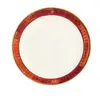 Foto de um(a) Prato Porcelana Steatita anos 40'S, da categoria de Pratos. Prato em porcelana com grega bordeaux com arabescos em ouro, da marca steatita dos anos 1940. Diâmetro: 18,5 cm peso: 263 g. Vendido no marketplace Trésors.