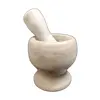Foto de um(a) Pilão de Mesa em Mármore, da categoria de Outros utensílios. Pilão de mesa com socador feito em mármore branco funcional e decorativo. A: 10,8 cm / Diâmetro: 7 cm / Diâmetro da base:... Vendido no marketplace Trésors.