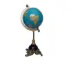 Foto de um(a) Globo Latão, da categoria de Globos. Globo terrestre com base em latão e madeira Peso: 790g A: 33 cm D: 13cm. Vendido no marketplace Trésors.