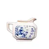 Foto de um(a) Cremeira São Caetano, Década de 1940, da categoria de Cremeiras. Cremeira em porcelana com estampa azul cobalto dos anos 1940 da marca são caetano/barros loureiro. A: 9,5 cm / L: 10,5 cm /... Vendido no marketplace Trésors.
