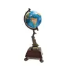 Foto de um(a) Globo Terrestre Robalo e Imbuia, Peça Única, da categoria de Globos. Globo terrestres de mesa: base em imbuia com pés de garra, tendo como haste um robalo em latão com pátina bronze. Globo... Vendido no marketplace Trésors.