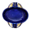Foto de um(a) Cinzeiro em Porcelana Azul Cobalto com Filete Dourado, Década de 1940, da categoria de Cinzeiros e coletores. Cinzeiro em porcelana azul cobalto com filete dourado, década de 1940. A: 3 cm / L: 14,5 cm Peso: 300 g. Vendido no marketplace Trésors.