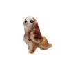 Foto de um(a) Mini Cocker Spaniel em Cerâmica, Década de 1940, da categoria de Modelos e estatuetas. Cachorra em cerâmica na cor caramelo da raça cocker spaniel. Sem marca do fabricante, década de 1940. A: 8,5 cm L: 9 cm P:... Vendido no marketplace Trésors.
