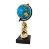 Foto de um(a) O Pensador Dourado, da categoria de Globos. O pensador dourado globo terrestre o pensador em porcelana dourada com base em madeira ebanizada A: 28cm Base: 9 x 9 cm ... Vendido no marketplace Trésors.