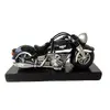 Foto de um(a) Moto Escultura 90'S, da categoria de Modelos e estatuetas. Moto escultura em resina e base em madeira ebanizada, década de 1990. Montagem: designer marcelus ribas A: 10,5 cm / L: 19,5... Vendido no marketplace Trésors.