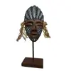 Foto de um(a) Escultura Indígena, da categoria de Escultura. Escultura com tema indígena em terracota com adereços em sisal e base em madeira. Peça única pelo designer marcelus ribas.... Vendido no marketplace Trésors.