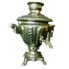 Foto de um(a) Samovar Russo Anos 40, da categoria de Chaleiras. Samovar russo elétrico em latão niquelado com alças em baquelite, década de 1940. A: 30cm/ Diâmetro: 17,5cm Base: 12 x 12cm... Vendido no marketplace Trésors.