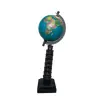 Foto de um(a) Globinho de Pisa, da categoria de Globos. Peça única pelo designer marcelus ribas. Torre de pisa global em metal patinado e bronze, com base em madeira ebanizada. ... Vendido no marketplace Trésors.