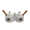 Foto de um(a) Galheteiro de Mesa em Porcelana, Década de 2000, da categoria de Saleiros e pimenteiros. Galheteiro de mesa em porcelana com adesivo de frutas somente de um lado. Tampa e colheres com cabo de madeira. Made in... Vendido no marketplace Trésors.