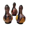 Foto de um(a) Bonecas em Porongo, Arte Peruana, Década de 1980, da categoria de Bonecas. Combo com 3 bonecas peruanas feitas com porongo, com decupagem das listras clássicas do tear manual. Únicas e divertidas,... Vendido no marketplace Trésors.