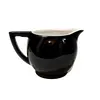 Foto de um(a) Leiteira Porcelana 90'S, da categoria de Leiteira. Leitera em porcelana bi color: nas cores preta por fora e branca por dentro sem marca de fabricante, década de 1990.A: 11 cm... Vendido no marketplace Trésors.