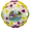 Foto de um(a) Antigo Prato Decorativo Bandeja Porcelana Alemã Art Nouveau, da categoria de Pratos Decorativos. Antigo e lindo prato com alças, bandeja em porcelana artística alemã, com belíssima decoração floral e medalhão central com... Vendido no marketplace Trésors.