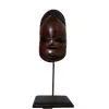 Foto de um(a) Máscara Africana em Madeira, da categoria de Modelos e estatuetas. Máscara africana esculpida em madeira com base também em madeira. Peso: 272g A: 32cm L: 11cm P: 8cm. Vendido no marketplace Trésors.